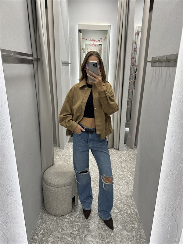 {{photo.Alt || photo.Description || 'Джинсы с эффектными декоративными потёртостями'}}